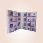 calendrier de l'avent rose en forme de livre avec boites cadeaux pour noel