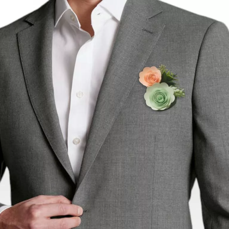 boutonniere homme homme moderne boutonniere de marie avec des fleurs corail et menthe en papier et du feuillage artificiel pour tout theme de mariage