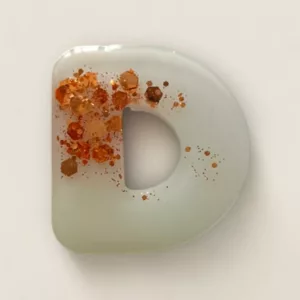 lettre resine D paillettes rose gold ideale comme porte cle ou marque place de mariage