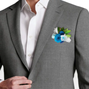 boutonniere homme elegance masculine boutonniere de marie avec des fleurs en papier bleu et une decoration sur le theme de mariage d'alice au pays des merveilles