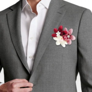 boutonniere homme fraicheur naturelle boutonniere de marie avec des fleurs en etoiles en papier rose rouge et ivoire et une perle nacree au centre pour tout theme de mariage