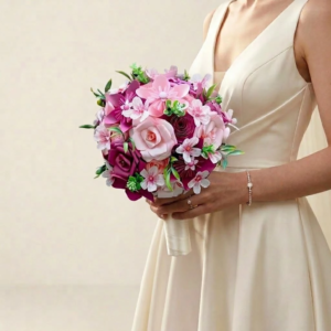 Bouquet de mariée rond et moderne réalisé en origami avec fleurs de papier rose tendre et fuchsia.